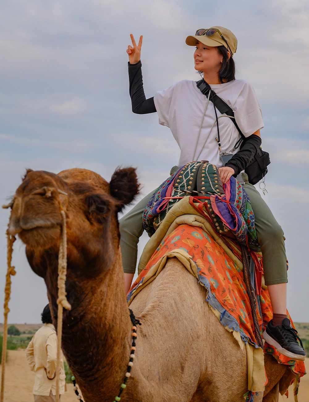 Guest on a camel safari at Sam Sand Dunes
